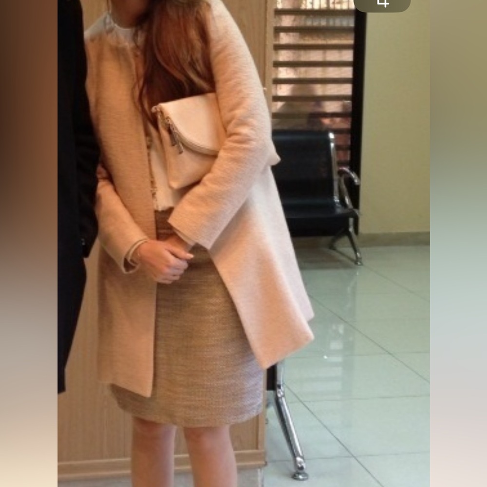 Coat with snap button